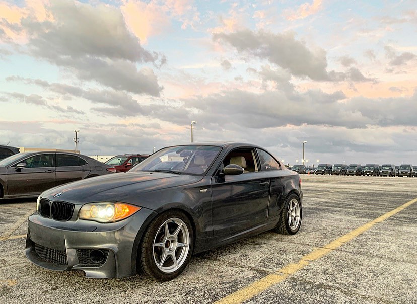 BMW 1 Series at sunset after service